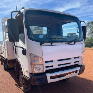 Front side view of 2008 Isuzu NH NP 4x4 tray top truck