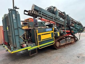 Cubex QXR920 GEN IV drill rig rear right side view showcasing the long drill boom