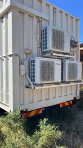 Triple air conditioning units fitted to a converted 20ft container custom 6 MAN accommodation
