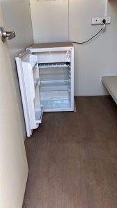 Single fridge inside custom 6 MAN accommodation
