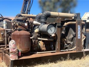 Caterpillar turbo diesel engine on skid mounted Sullair 1150/350 air compressor