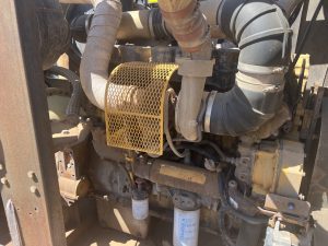 Side view of Caterpillar turbo diesel engine on Sullair 1150/350 air compressor